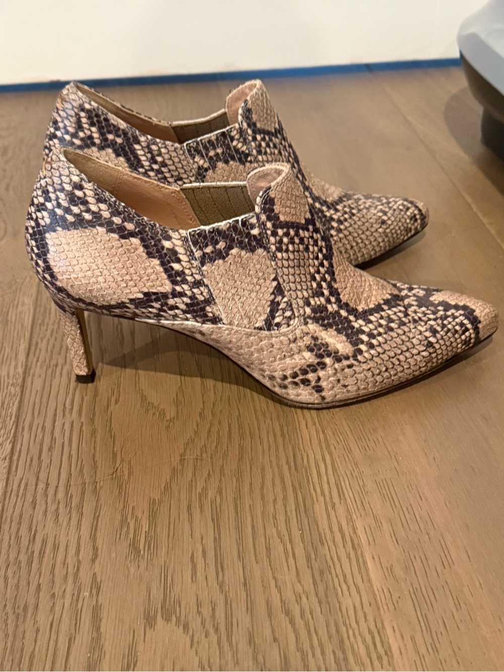 Snake-Print Pointed Toe Ankle Booties in Beige and Black